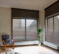 Wooden,blinds,on,large,windows,in,the,interior.,living,room